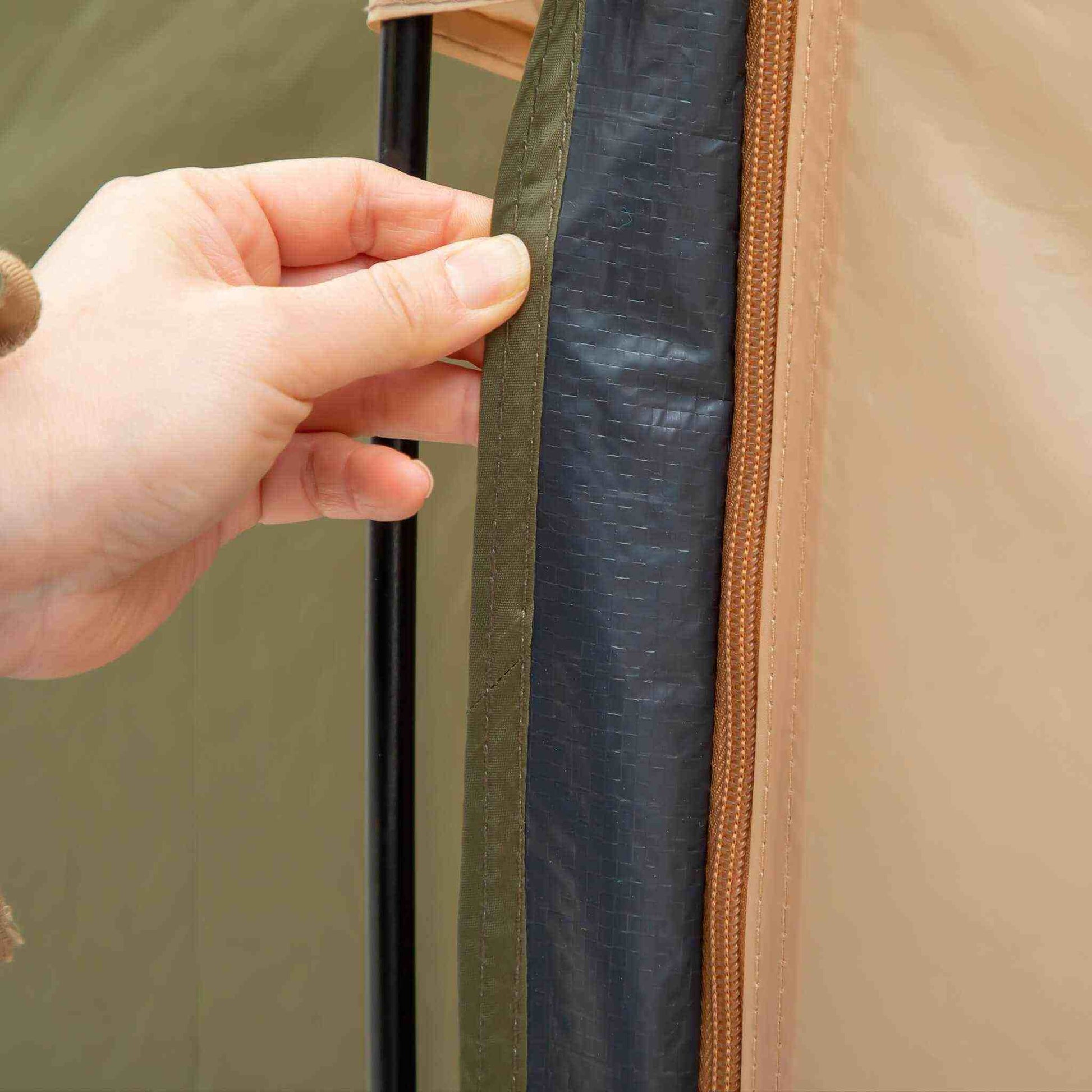 Close-up of durable zipper on 4-person group tent.