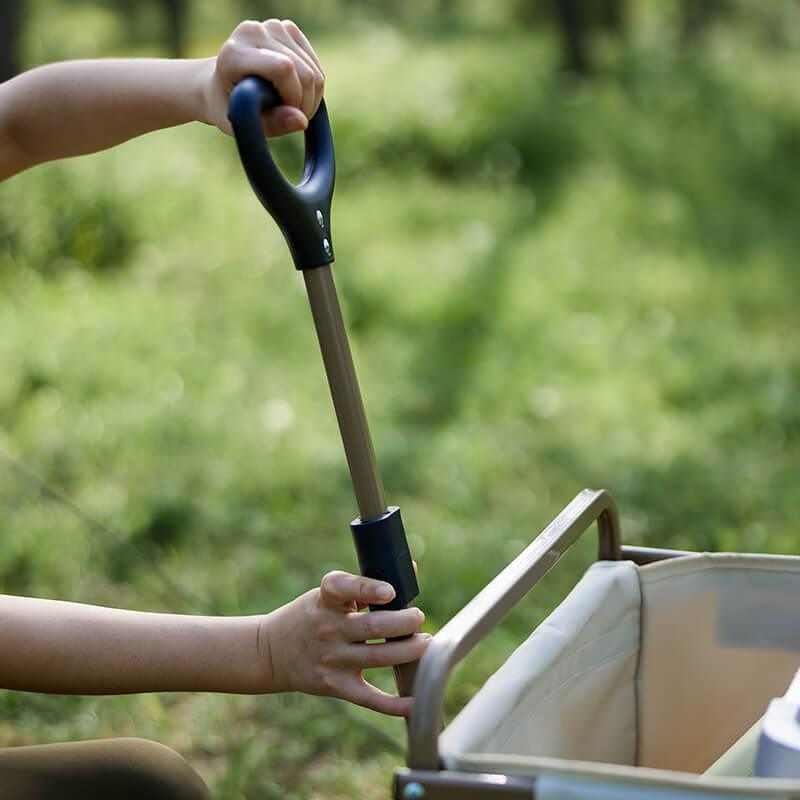 Foldbar mini trækvogn med stærk stålramme, velegnet til camping og strandture.