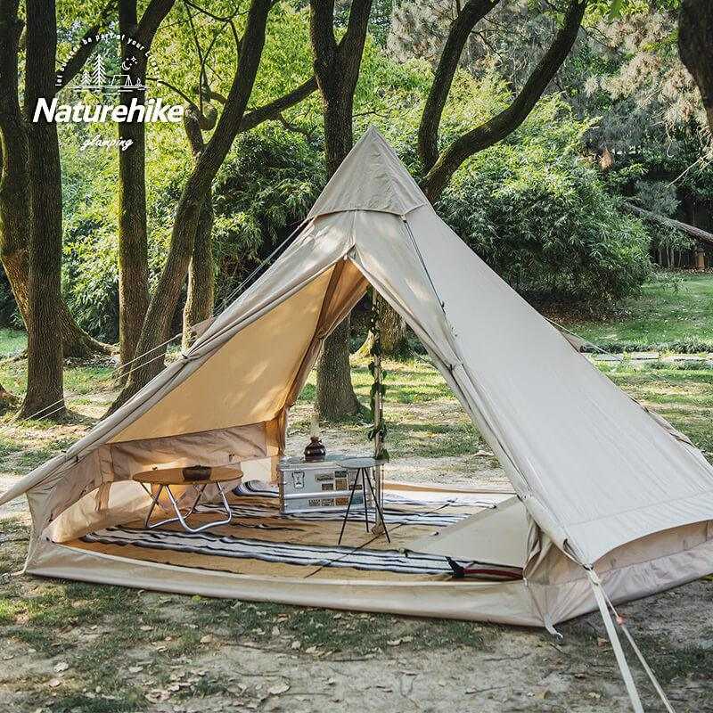 Glamping tipi telt 6.4 from Naturehike set up in a forest setting, highlighting its spacious interior and durable design.